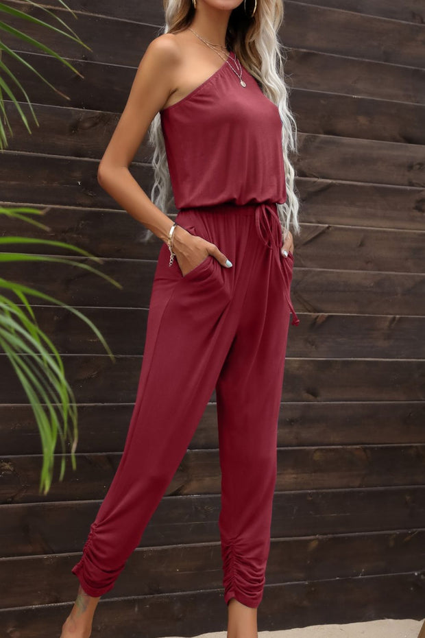 Drawstring Waist One-Shoulder Jumpsuit with Pockets www.nizzadesign.com