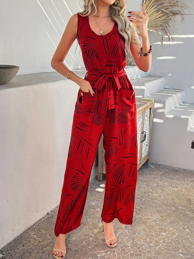 Devine Printed Round Neck Sleeveless Tie Waist Jumpsuit www.nizzadesign.com