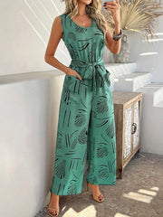 Devine Printed Round Neck Sleeveless Tie Waist Jumpsuit www.nizzadesign.com