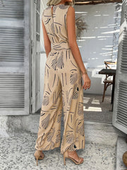 Devine Printed Round Neck Sleeveless Tie Waist Jumpsuit www.nizzadesign.com