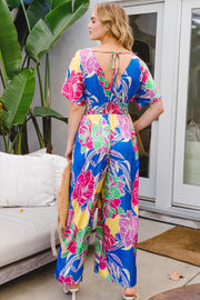 ODDI Full Size Floral Smocked Tied Back Jumpsuit www.nizzadesign.com