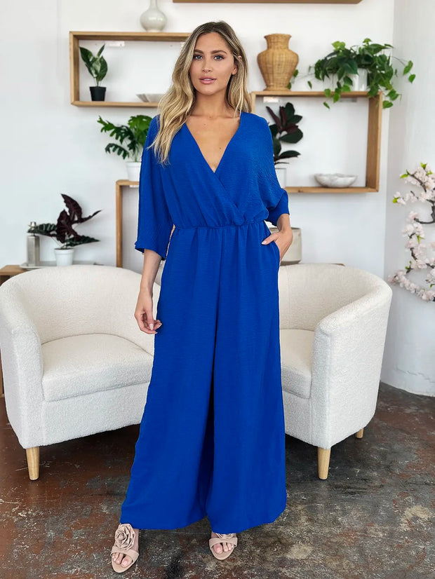 Double Take Full Size Surplice Wide Leg Jumpsuit with Pockets www.nizzadesign.com