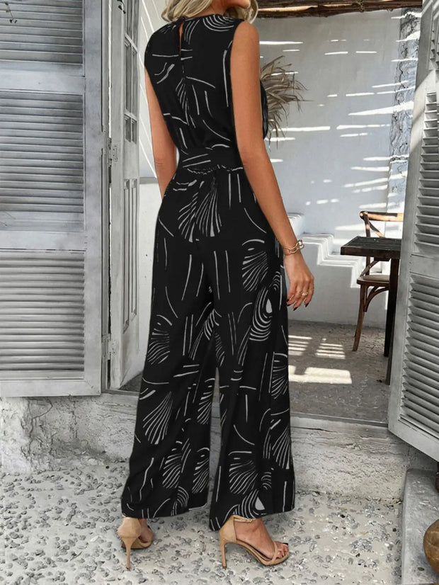 Devine Printed Round Neck Sleeveless Tie Waist Jumpsuit www.nizzadesign.com