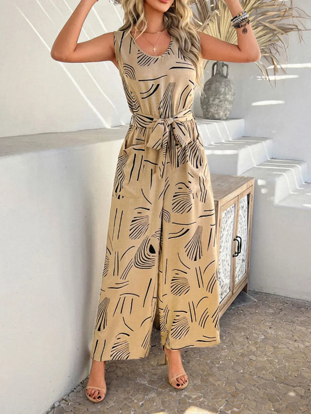 Devine Printed Round Neck Sleeveless Tie Waist Jumpsuit www.nizzadesign.com