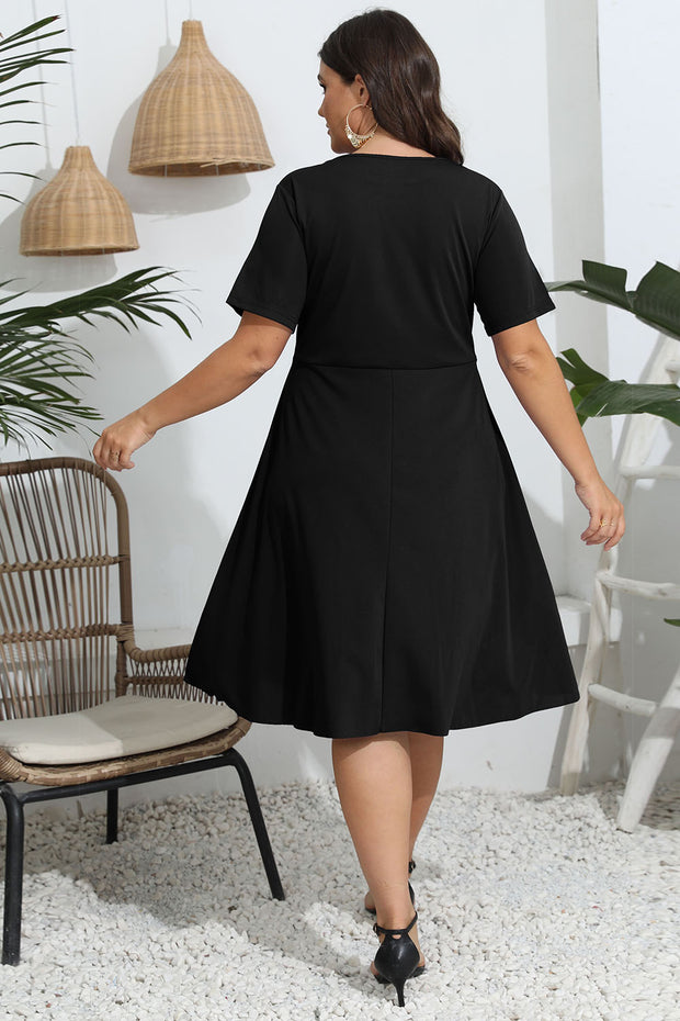 Plus Size Round Neck Openwork Dress www.nizzadesign.com