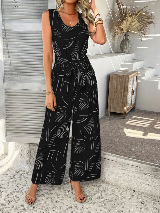 Devine Printed Round Neck Sleeveless Tie Waist Jumpsuit www.nizzadesign.com