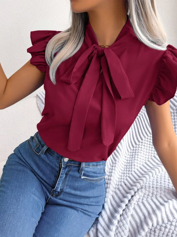 Ruffle Cap Sleeve Bow Tie Blouse www.nizzadesign.com